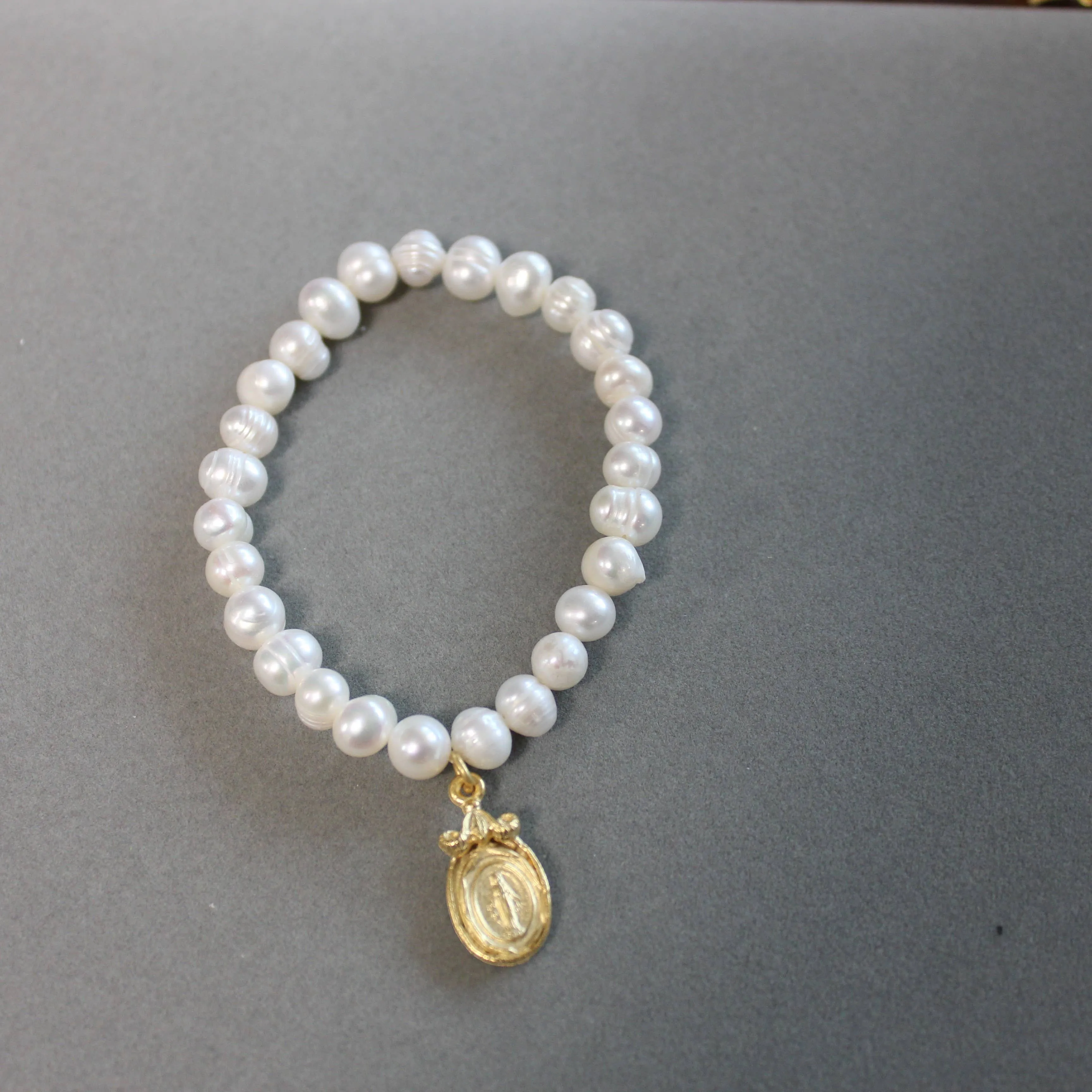 BR201 Pearl Stretch Bracelet with Virgin Mary Medal