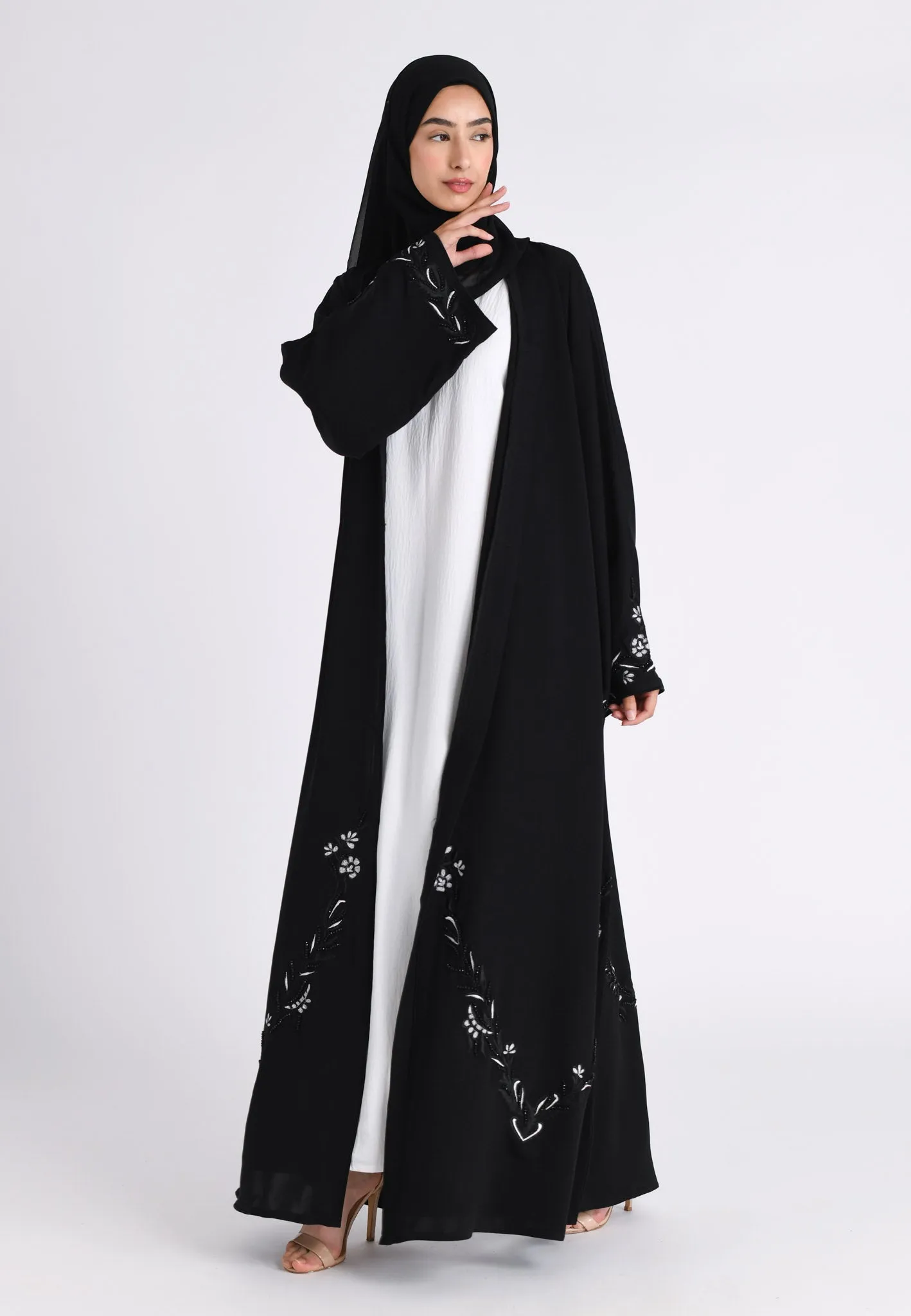 Elegant Noir Embroidered Abaya With Minimal Embellishments