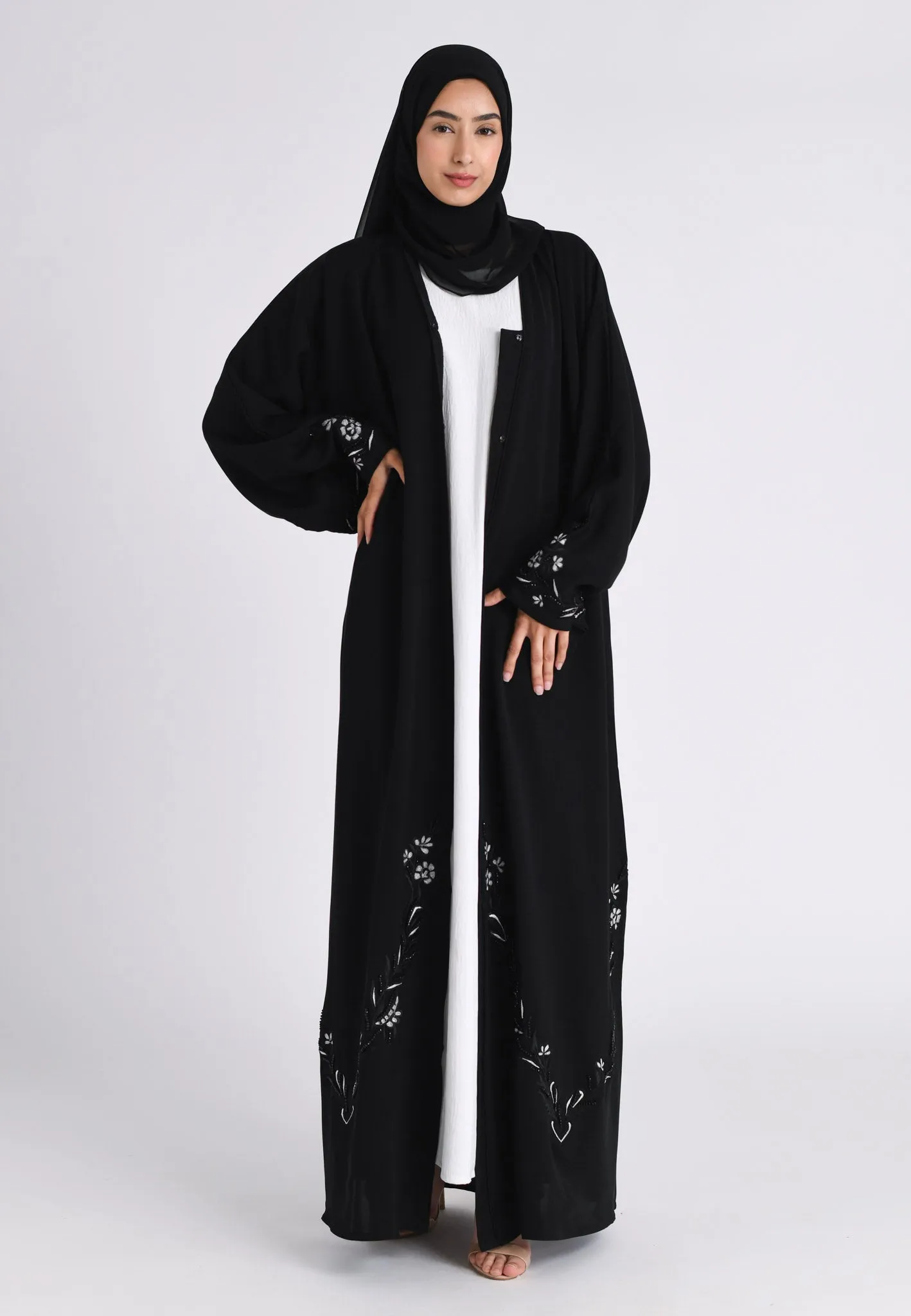 Elegant Noir Embroidered Abaya With Minimal Embellishments