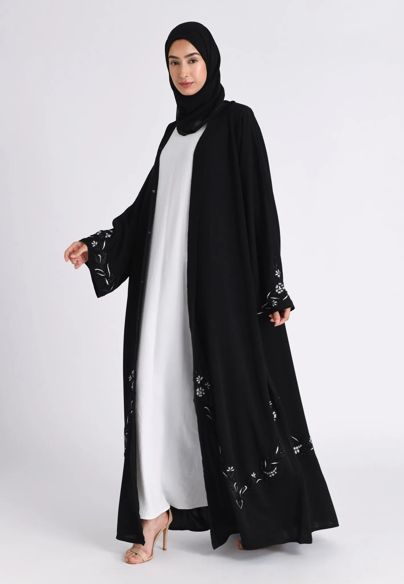 Elegant Noir Embroidered Abaya With Minimal Embellishments