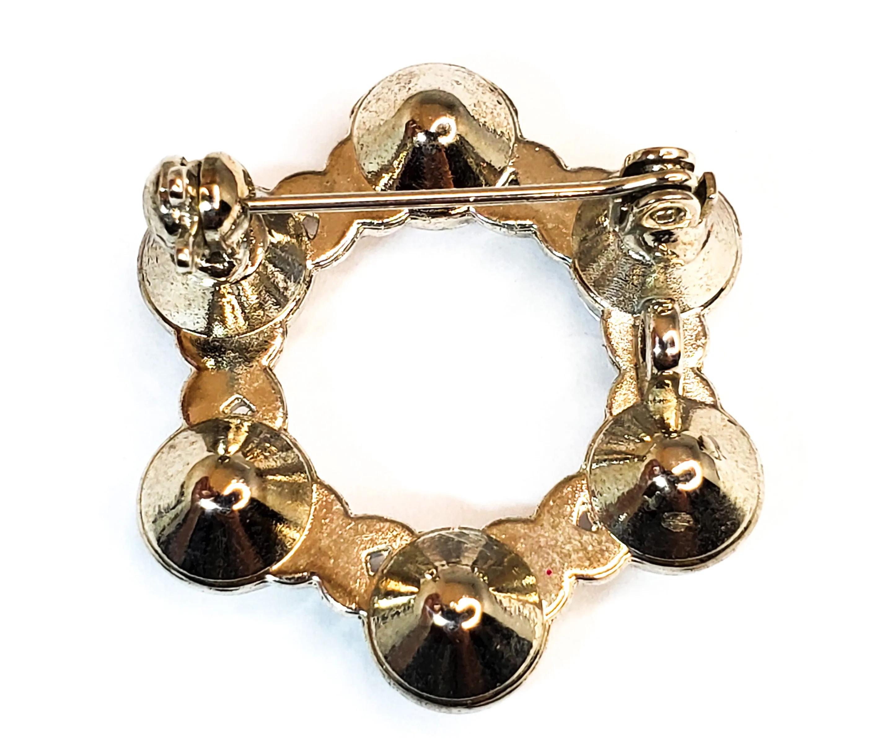 Pave set rhodium plated bright clear rhinestone circle brooch