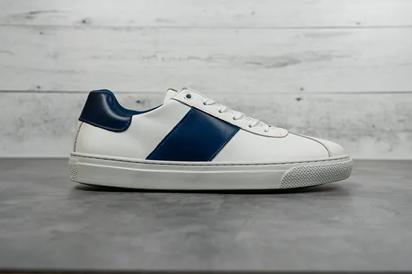 The Jolt Sneaker in White/Royal