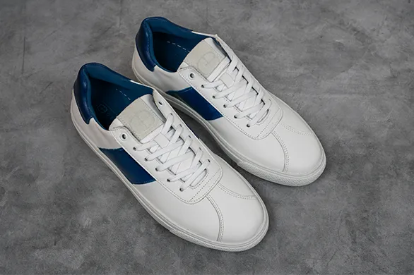 The Jolt Sneaker in White/Royal